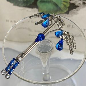 Vintage silver-toned blue and white crystal rhinestone branch shaped brooch